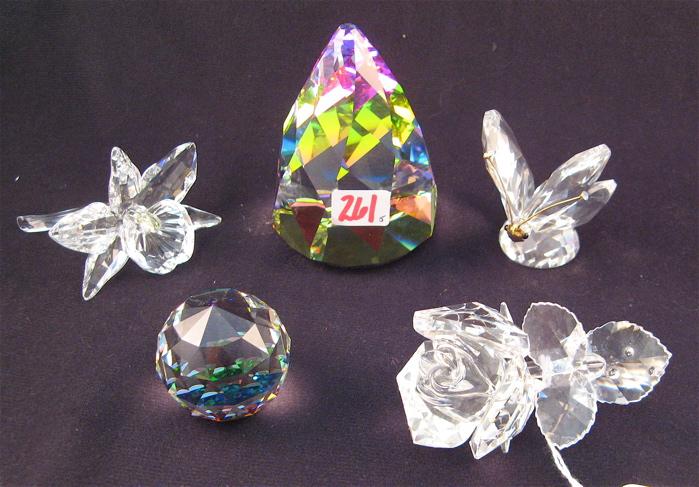 Appraisal: FIVE PIECES OF SWAROVSKI AUSTRIAN CRYSTAL Including faceted clear-to-rainbow color