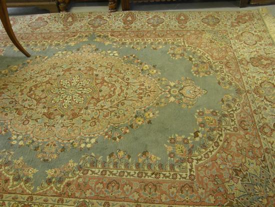 Appraisal: Green ground modern Persian rug with main floral border and