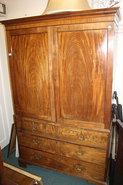 Appraisal: A TH CENTURY MAHOGANY CONVERTED LINEN PRESS the base fitted