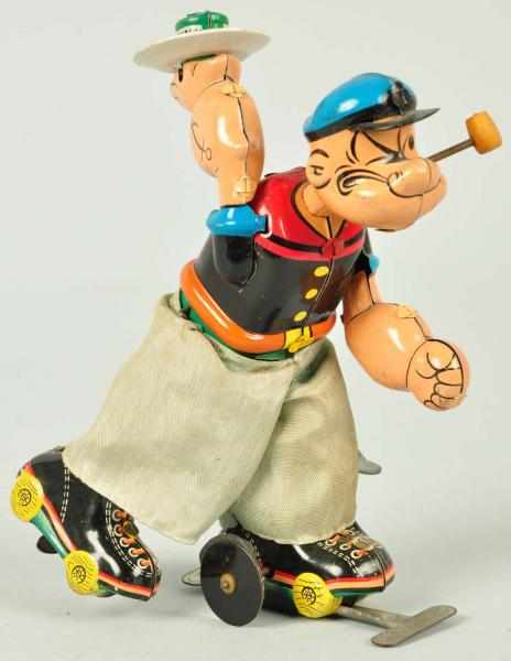 Appraisal: Tin Litho Linemar Popeye Skater Wind-Up Toy Description Japanese Working