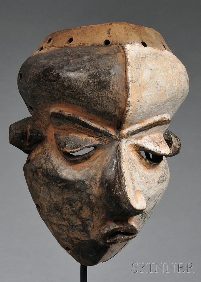 Appraisal: African Carved Wood Mask Pende Mbangu mask with twisted face