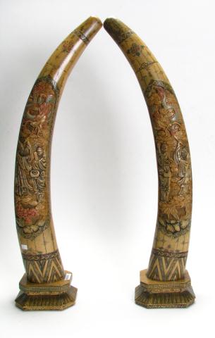 Appraisal: A Pair of Carved Tusk Form Whale Bone '' high