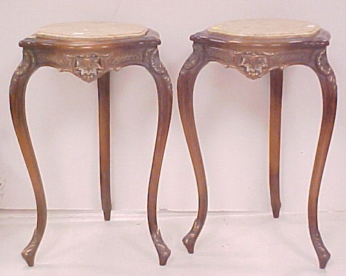 Appraisal: th C pair of Continental carved fruitwood stands inset marble