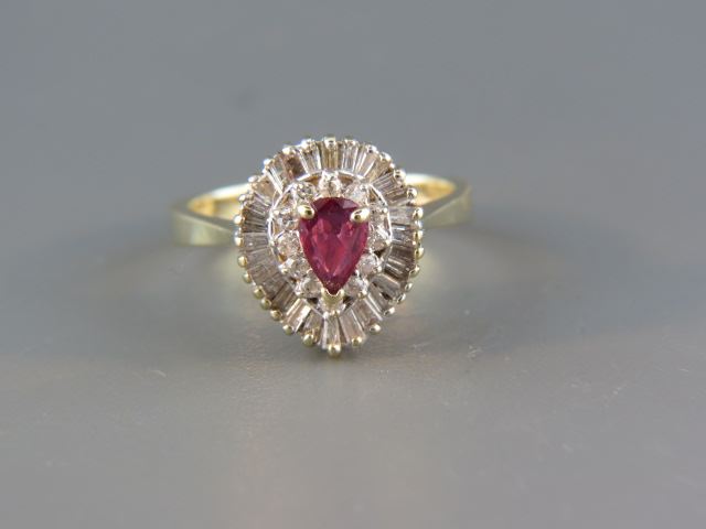 Appraisal: Ruby and Diamond Ring rich carat marquise ruby surrounded by