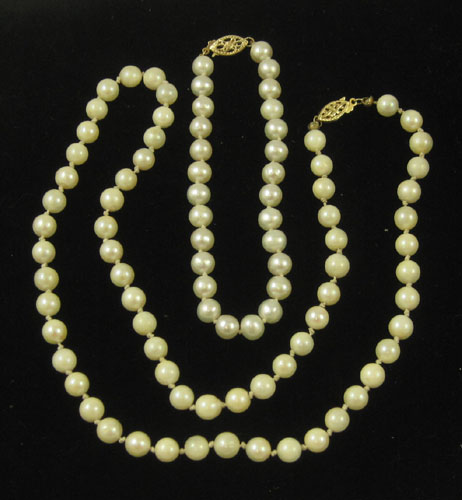 Appraisal: TWO ARTICLES OF PEARL AND YELLOW GOLD JEWELRY including an