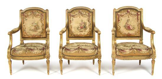 Appraisal: Group of Three Louis XV Giltwood Armchairs having Aubusson upholstery