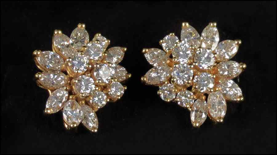 Appraisal: PAIR OF DIAMOND AND KARAT YELLOW GOLD EARCLIPS Seven round