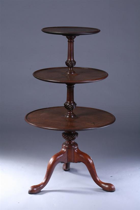 Appraisal: GEORGIAN MAHOGANY THREE-TIERED DUMBWAITER early th century Raised molded-edges spiral-carved