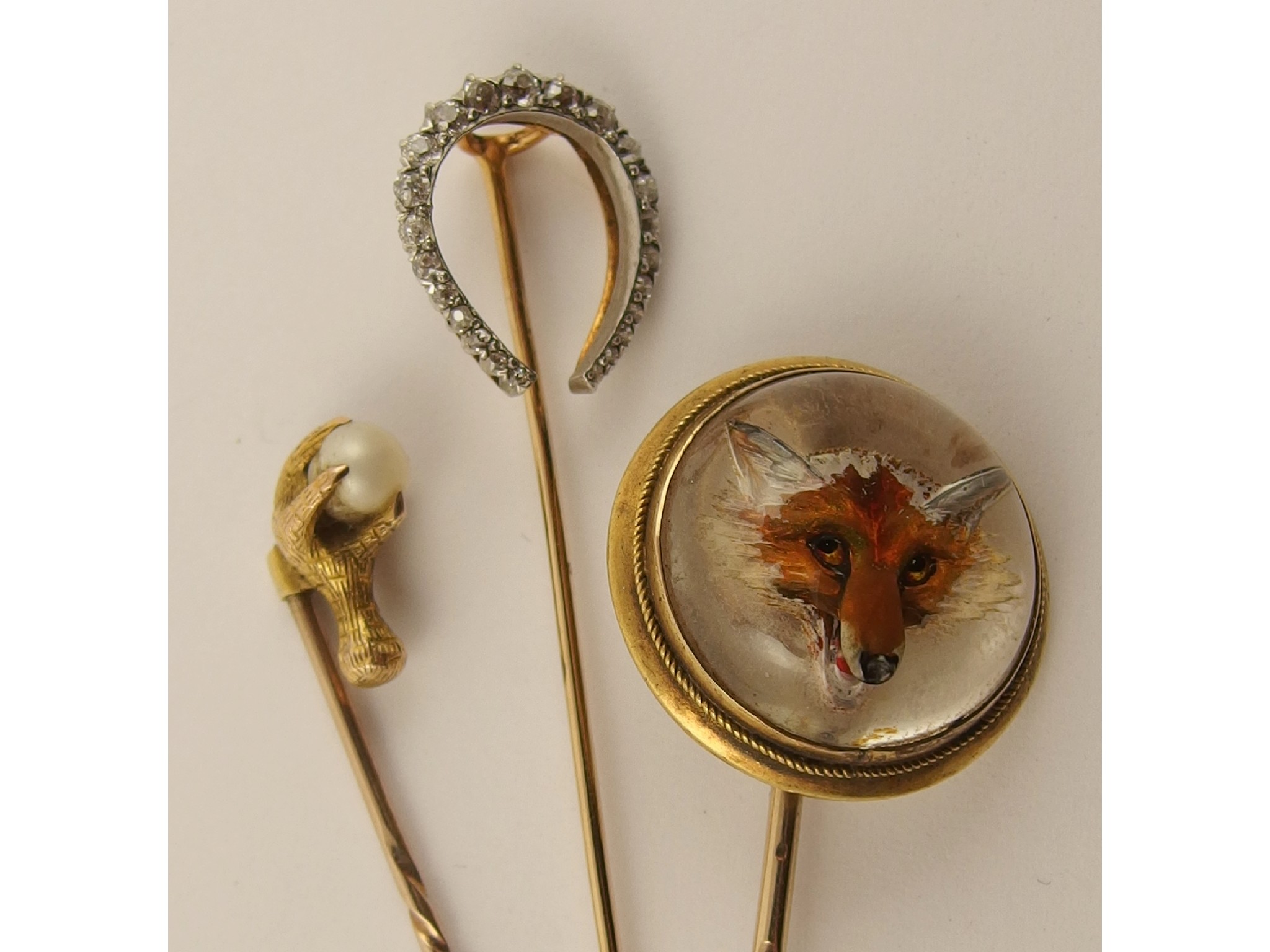 Appraisal: An Essex crystal stick pin of a foxsuperbly back carved