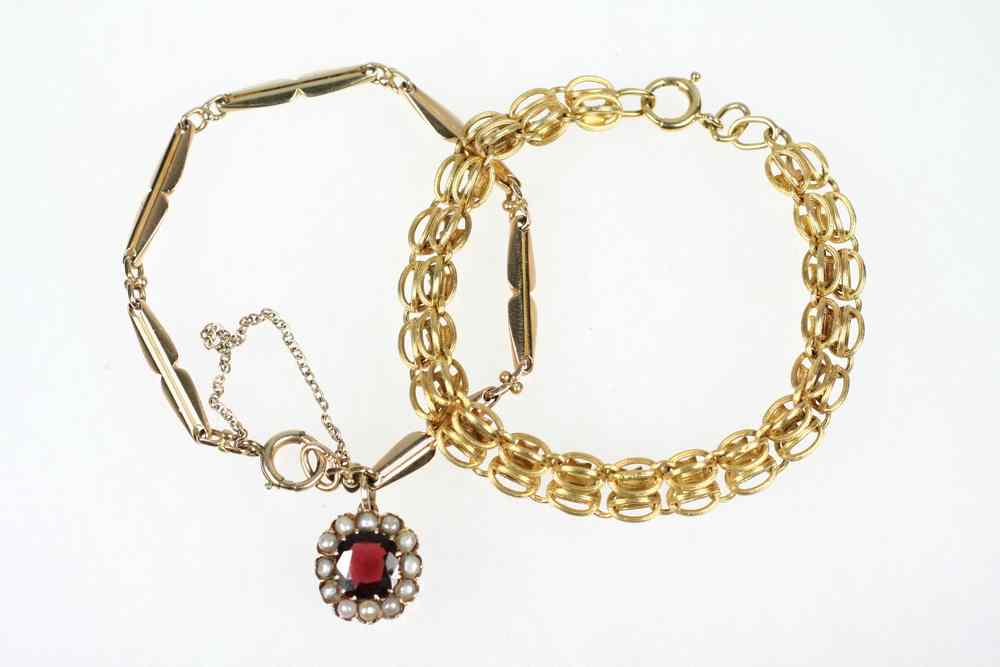 Appraisal: ANTIQUE BRACELETS - The first K yellow gold double oval