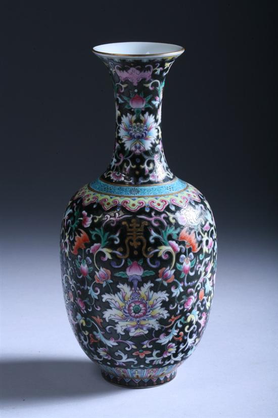 Appraisal: CHINESE FAMILLE NOIRE PORCELAIN VASE Qianlong four-character overglazed blue mark