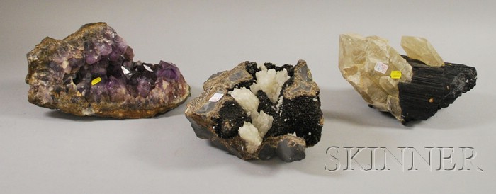 Appraisal: Three Geodes including possibly tourmaline and quartz calcite and amethyst