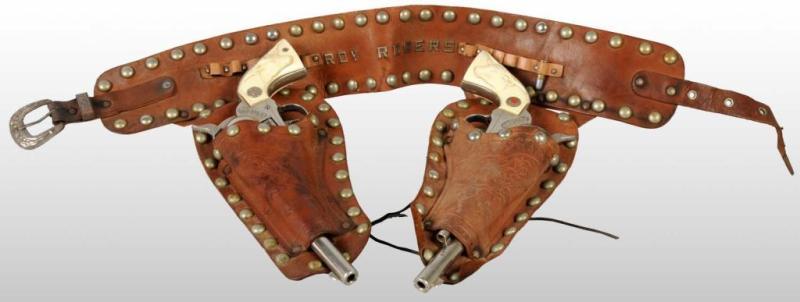 Appraisal: Roy Rogers Toy Double Gun Holster Set Description Includes Roy