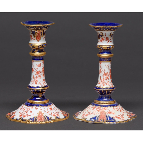 Appraisal: A pair of Royal Crown Derby Japan pattern candlesticks cm