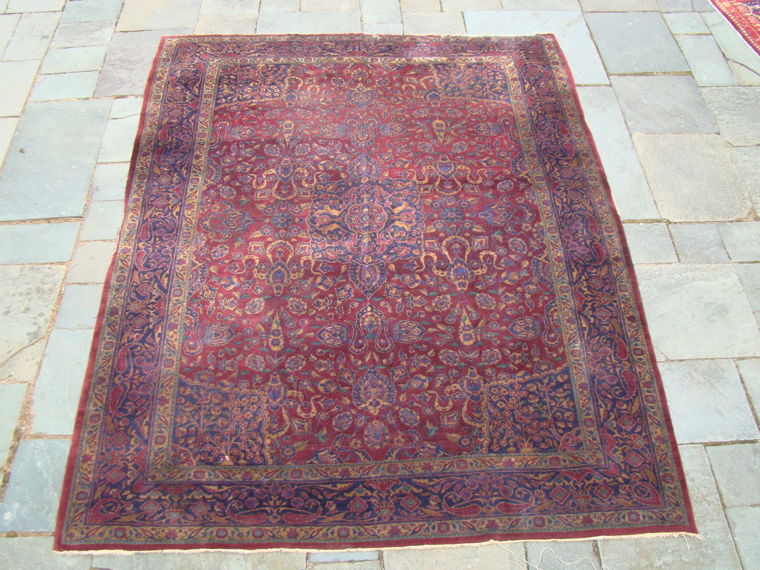 Appraisal: ORIENTAL RUG SAROUK ' x ' Central navy blue medallion