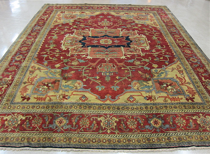 Appraisal: LARGE HAND KNOTTED ORIENTAL CARPET Persian Serapi design of central