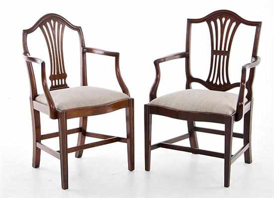 Appraisal: Hepplewhite style carved mahogany armchairs late th century curved crest