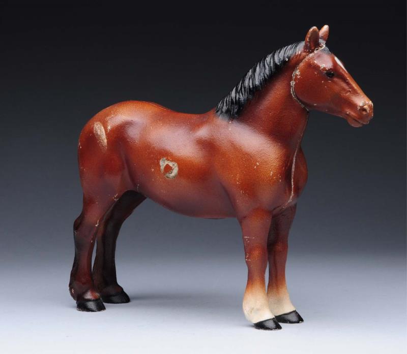 Appraisal: Cast Iron Percheron Work Horse Doorstop Made by Hubley cat