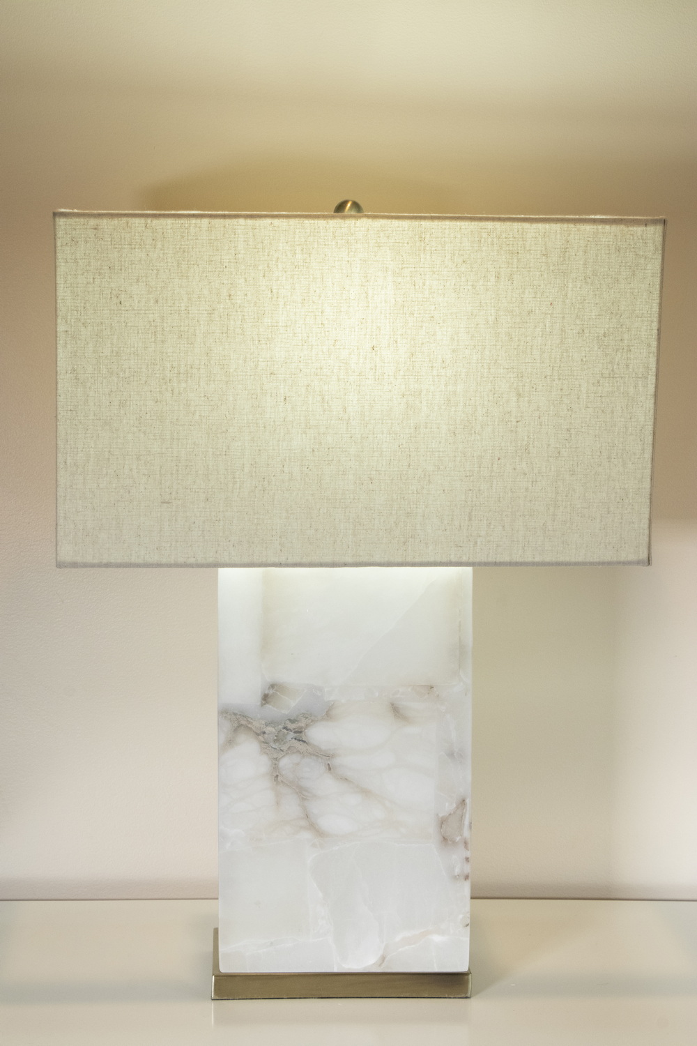 Appraisal: RECTANGULAR MARBLE TABLE LAMP A modern lamp built out of