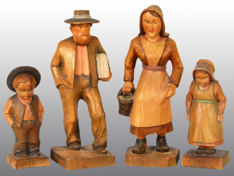 Appraisal: Lot of Carved Wooden Figures of Amish Condition Excellent Size