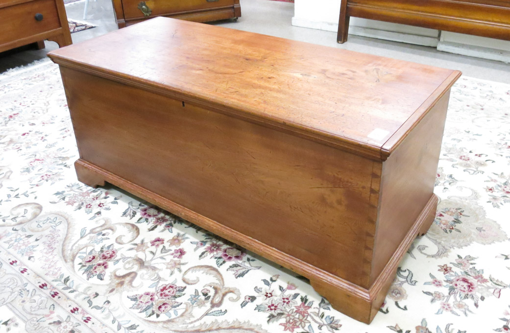 Appraisal: LIFT-TOP BLANKET CHEST American th century with exposed dovetail corner