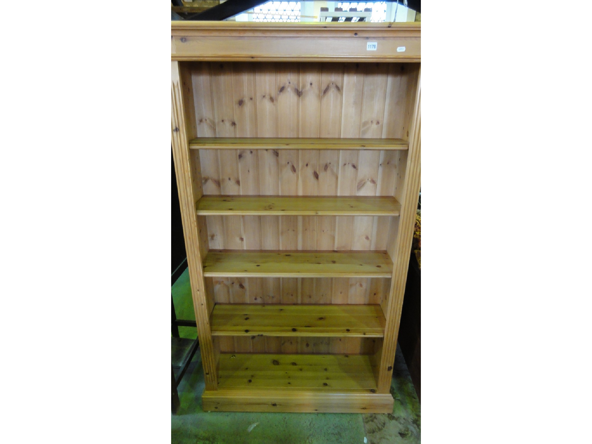 Appraisal: A modern stripped pine free standing open bookcase with four