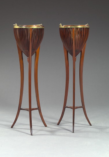 Appraisal: Pair of Regency-Style Mahogany and Brass-Lined Tripodal Jardinieres the tapering