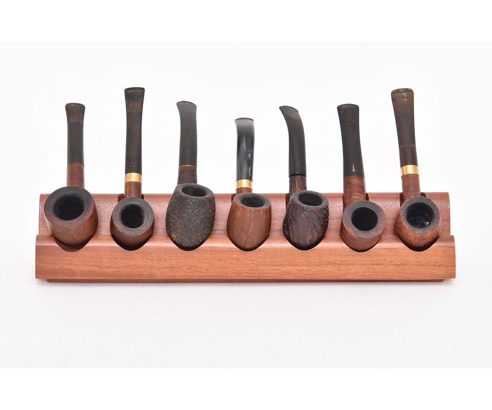 Appraisal: Smoking Pipes and Stand Seven smoking pipes by Savinelli Oscar