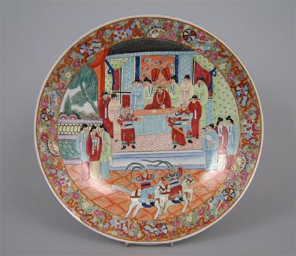 Appraisal: Chinese Export Famille Rose charger In the typical palette decorated