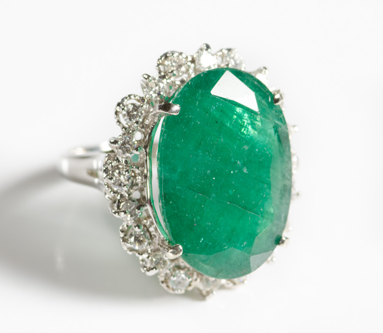 Appraisal: EMERALD DIAMOND AND FOURTEEN KARAT WHITE GOLD RING with round