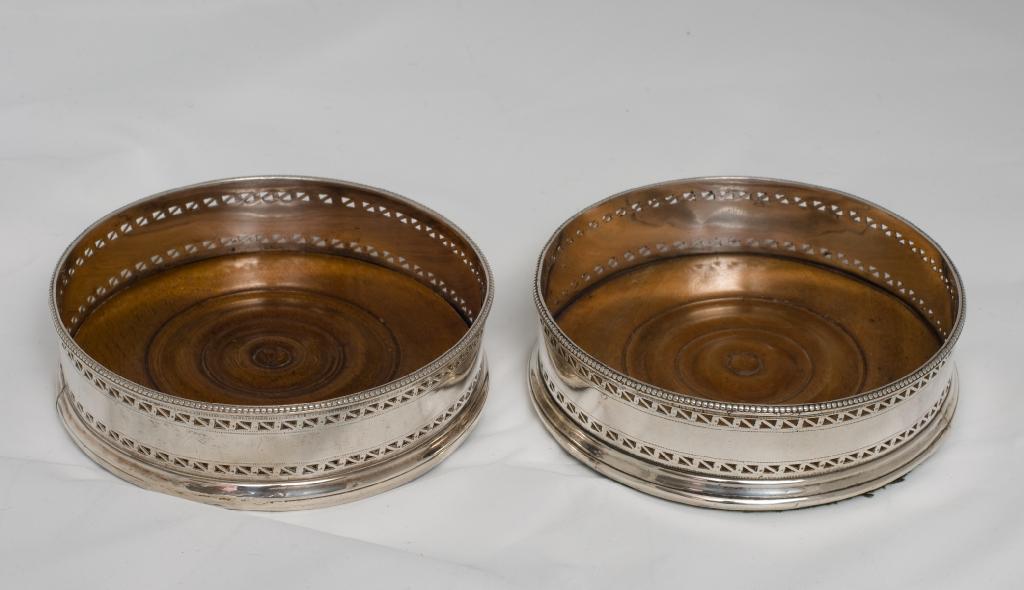 Appraisal: PAIR OF GEORGE III SILVER COASTERS PROBABLY LONDON of pierced