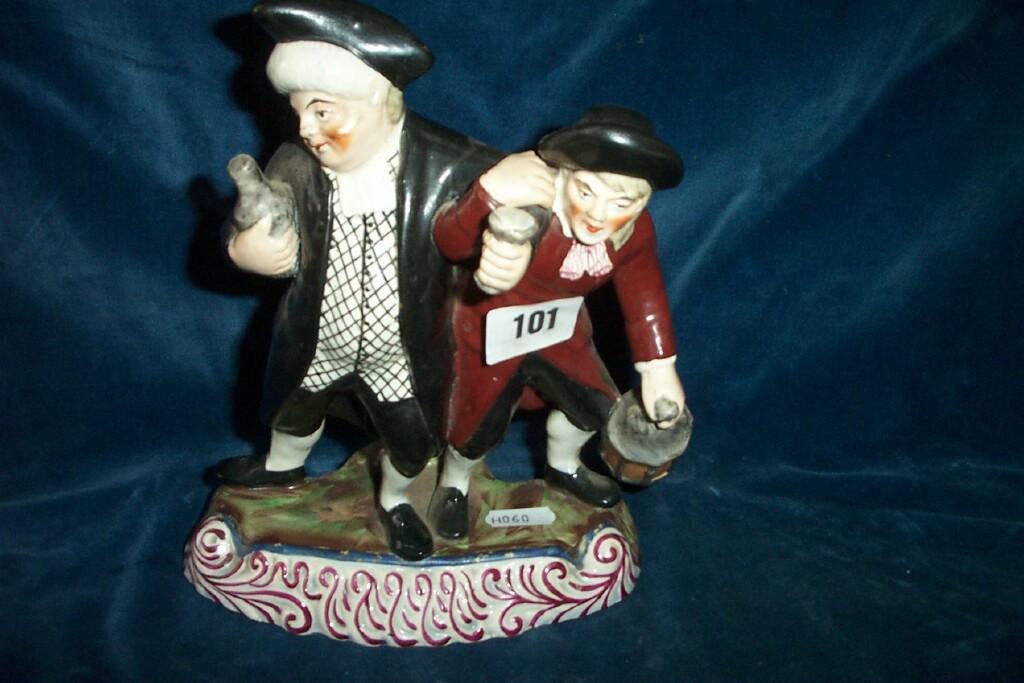 Appraisal: An early th century Staffordshire group Drunken Parson -