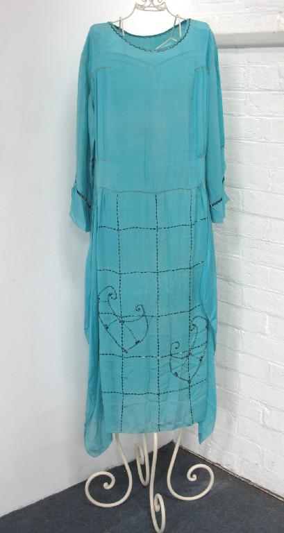 Appraisal: A 's turquoise silk dress with full length sleeves decorated