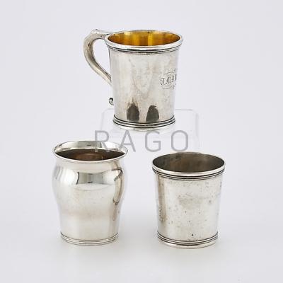 Appraisal: SEVEN AMERICAN SILVER MUGS OR CUPS Bulbous tapered cylinder marked