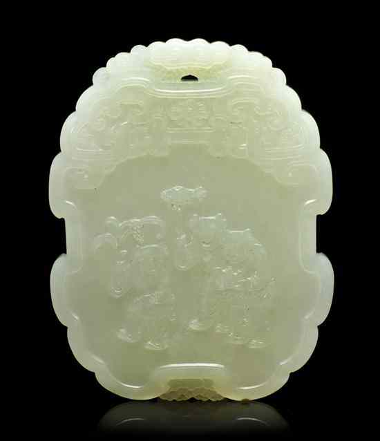 Appraisal: A White Jade Plaque of cartouche form having raised four-character