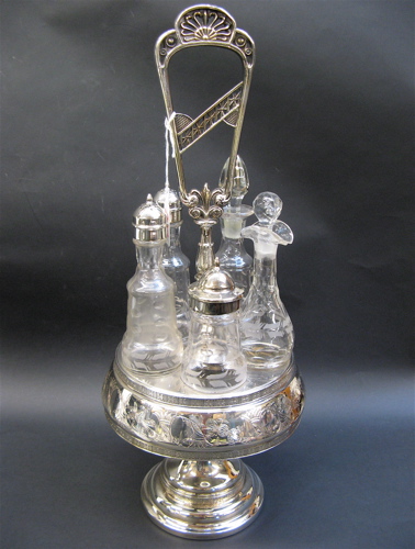 Appraisal: AMERICAN SILVER PLATED VICTORIAN CASTOR SET having molded glass bottles