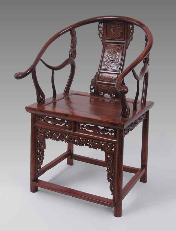 Appraisal: RICHLY CARVED ELMWOOD CHINESE HORSE SHOE BACK CHAIR Carved and