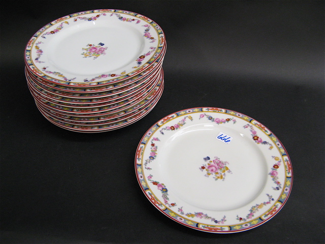 Appraisal: TWELVE BAVARIAN FINE CHINA DINNER PLATES with floral center and