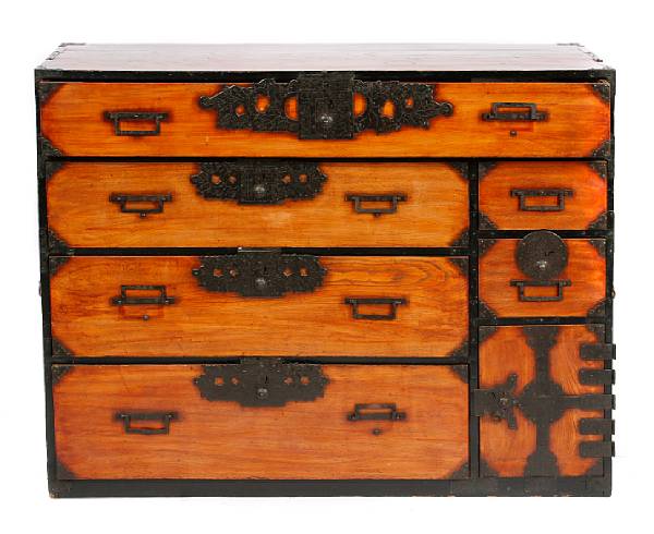 Appraisal: A single section mixed wood tansu with colored lacquer finishes