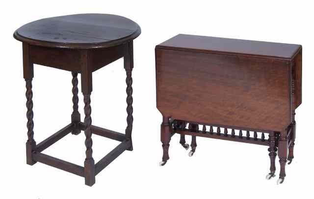 Appraisal: A VICTORIAN MAHOGANY SUTHERLAND TABLE with turned supports wide together