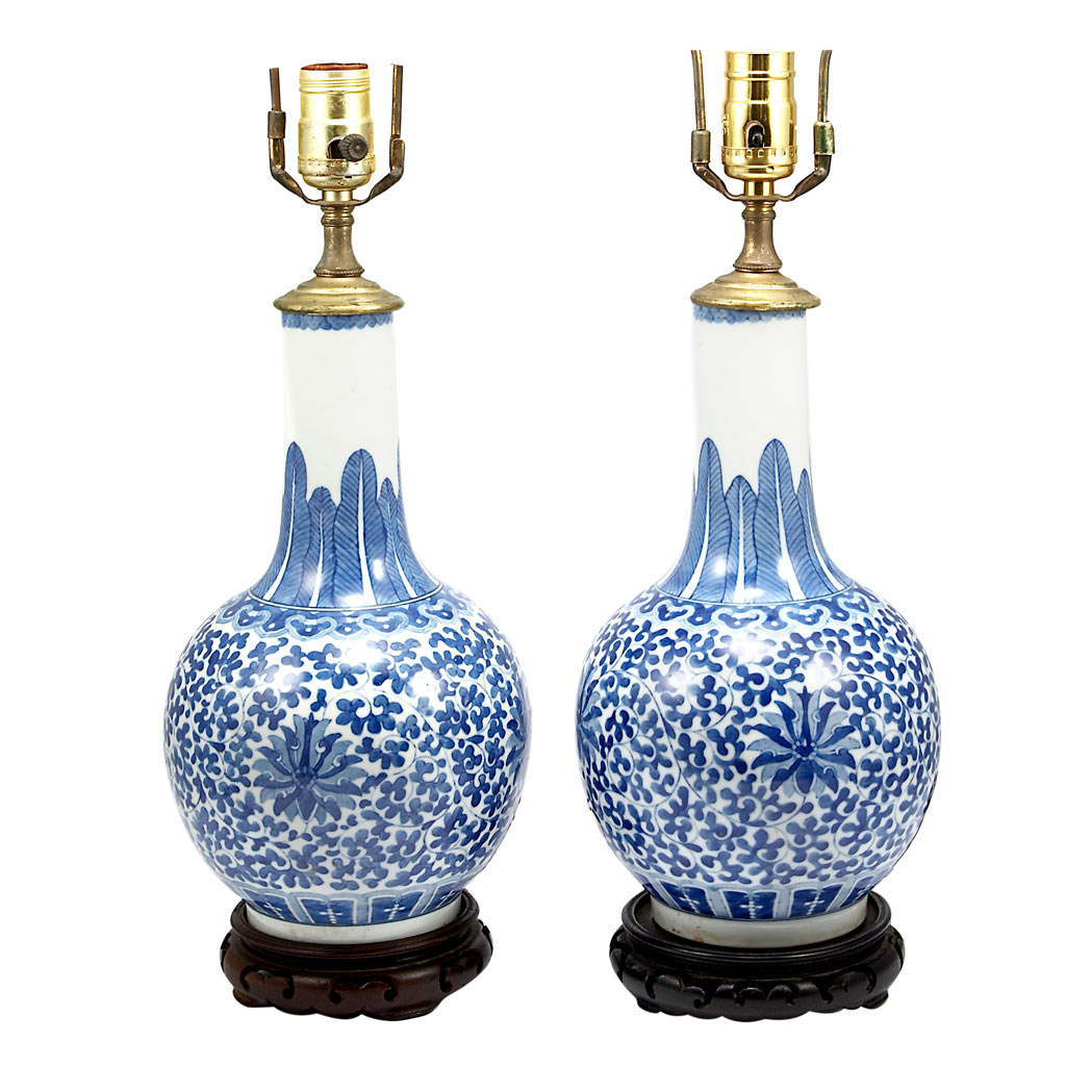 Appraisal: Pair of Chinese Blue and White Porcelain Vases Each mounted