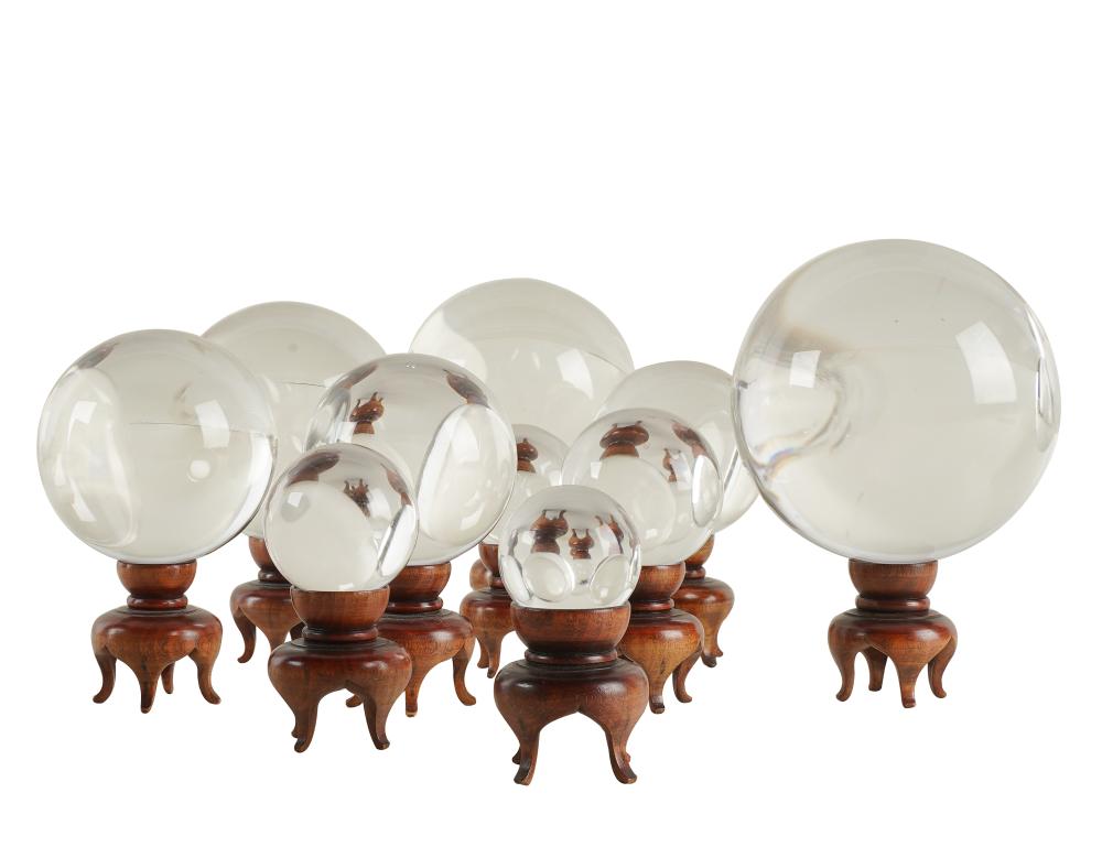 Appraisal: GROUP OF TEN GLASS ORBSeach on fitted wood base Provenance