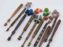 Appraisal: Ten stone mounted wooden lace bobbins