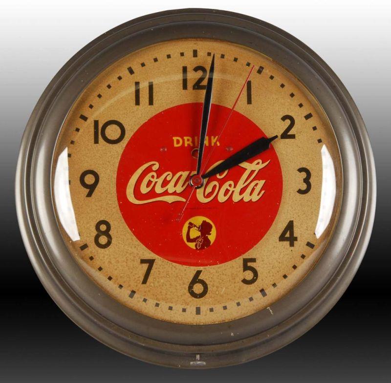 Appraisal: Coca-Cola Telechron Electric Clock Description Circa Face is fairly pitted