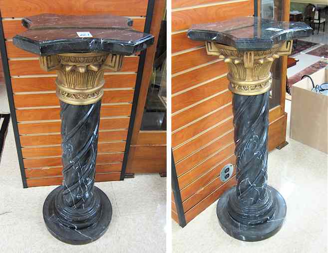 Appraisal: A PAIR OF ORMOLU AND BLACK PORFIDO MARBLE PEDESTALS each