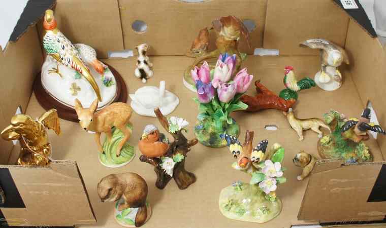 Appraisal: A Collection of Crown Staffordshire Animals and Birds comprising Dogs