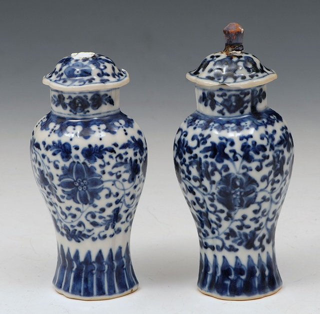 Appraisal: A PAIR OF MINIATURE CHINESE BLUE AND WHITE PORCELAIN VASES