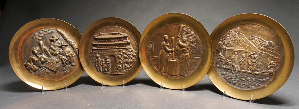 Appraisal: FOUR CHINESE ROUND BRASS PLAQUES AND TWO PATINATED METAL FIGURES