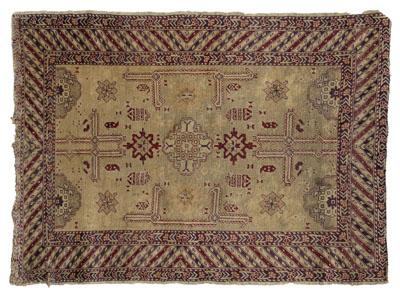 Appraisal: th century Turkish rug repeating geometric and floral designs on