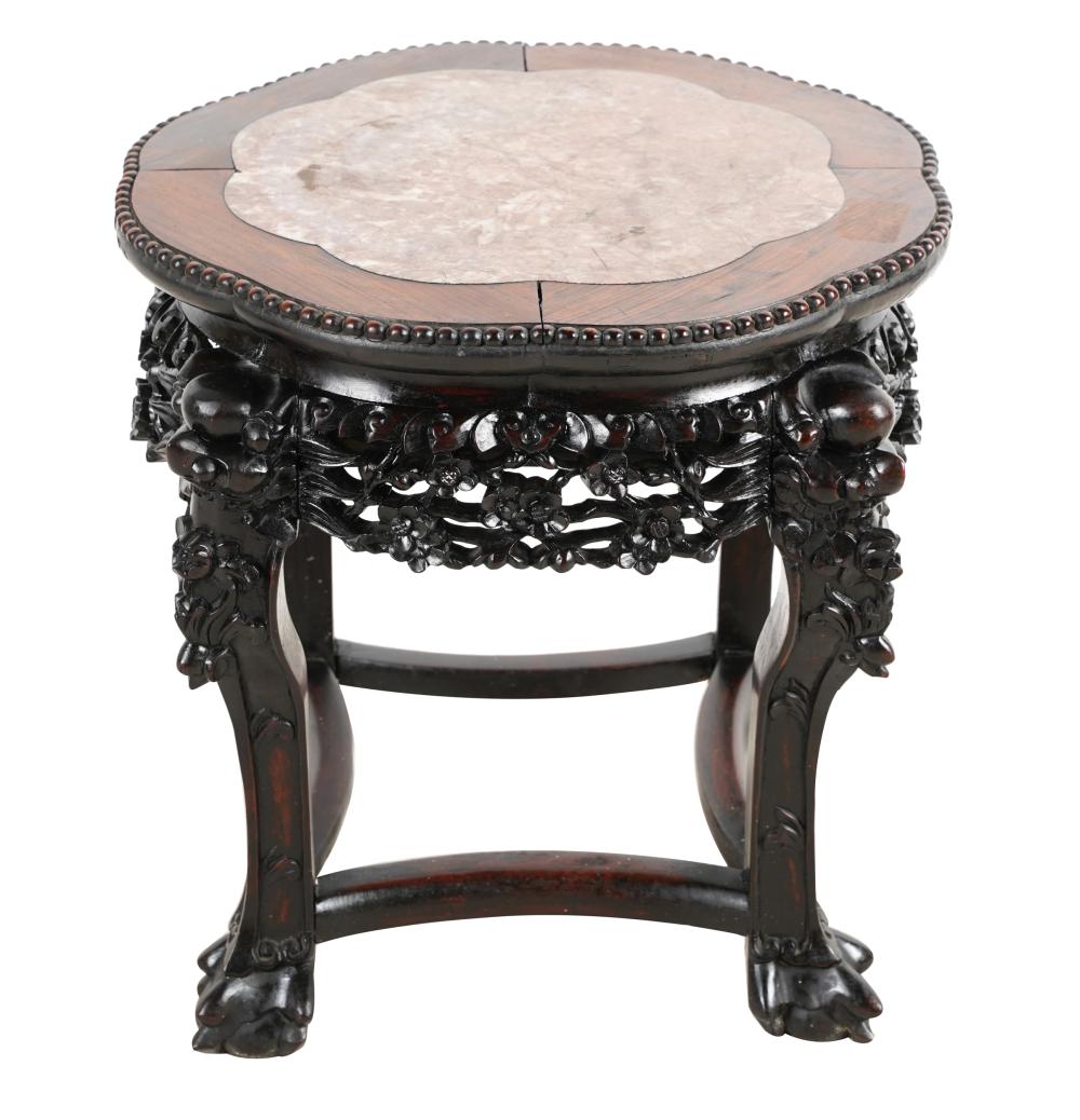 Appraisal: CHINESE CARVED HARDWOOD MARBLE-INSET TABORETwith fretwork apron inches diameter inches